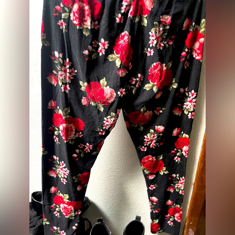No Boundaries Black Pants with Red and Green Floral Design